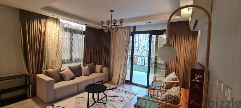 115 m2 Ground floor + garden Azad AUC - شقة بفروشة بكومباوند ازاد 1