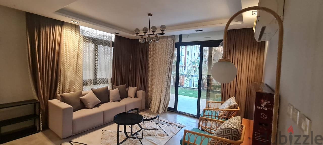 115 m2 Ground floor + garden Azad AUC - شقة بفروشة بكومباوند ازاد 1